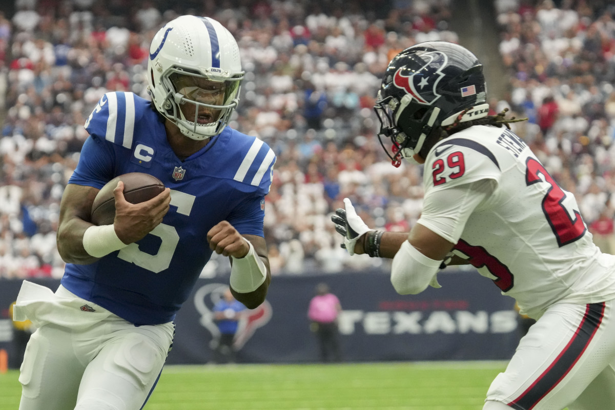 Sep 17, 2023; Houston, Texas, USA; Houston Texans safety M.J. Stewart (29) tries to tackle Indianapolis Colts quarterback Anthony Richardson (5) as he rushes in a touchdown Sunday, Sept. 17, 2023, during a game against the Houston Texans at NRG Stadium. Mandatory Credit: Jenna Watson-USA TODAY Sports